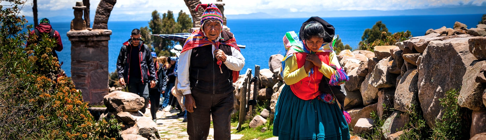Puno - Locals walking on the Taquile island
