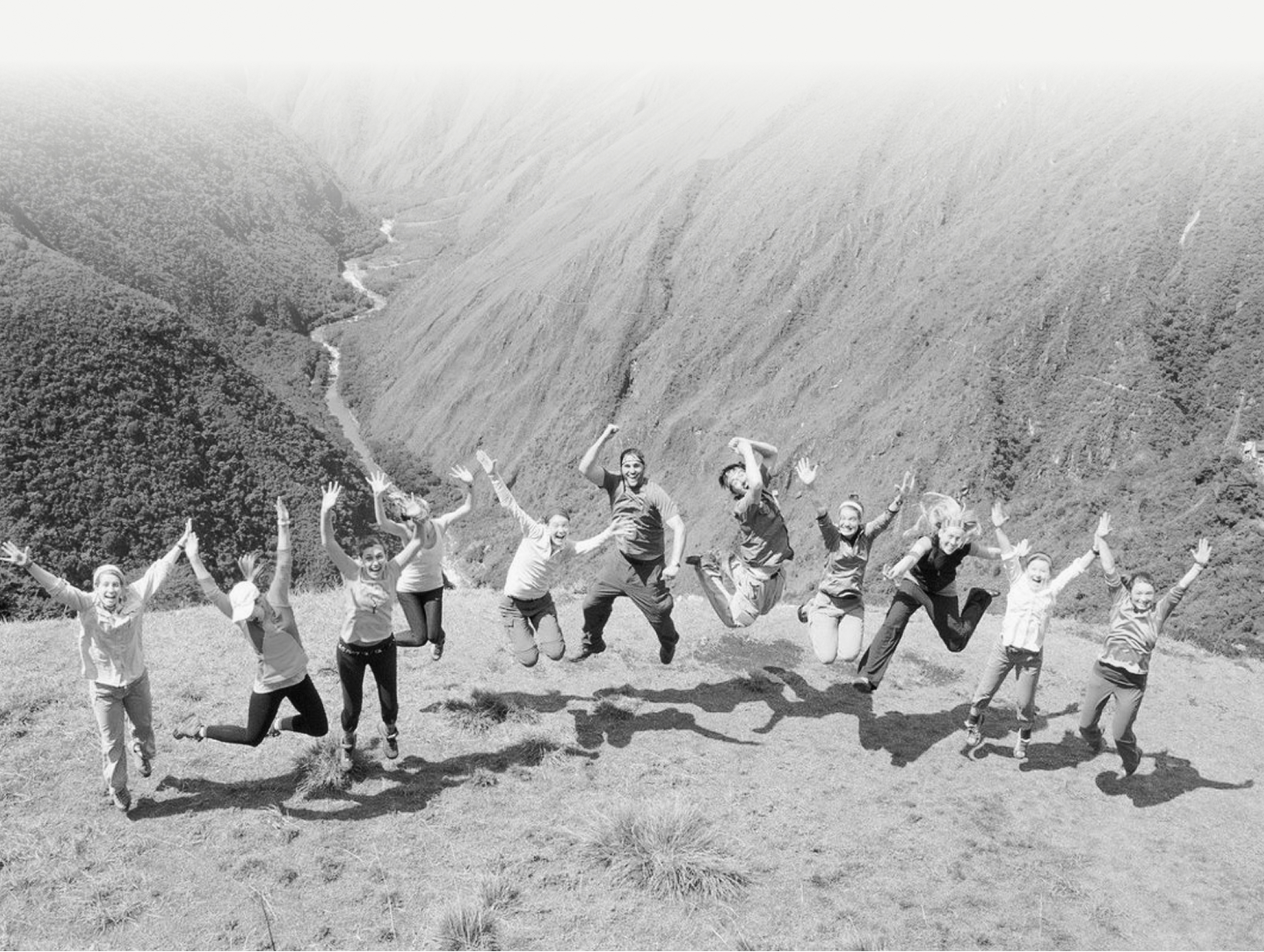 Happy tour group with guides enjoying scenic Latin America travel experience